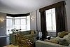 After:  Dining room shot on Central Park West - solar shades, contoured flat valance with kick pleats, ripplefold draperies and 